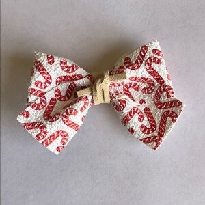 Red and White Glitter Candy Cane Bow